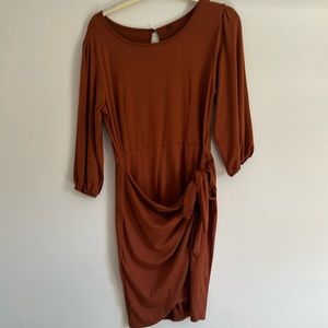 Burnt orange faux wrap skirted dress